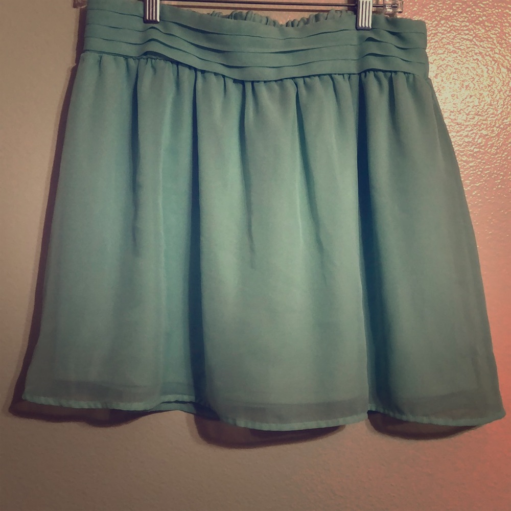 Sea foam, flowing mini skirt.